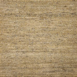 Textured handwoven carpet in beige. 