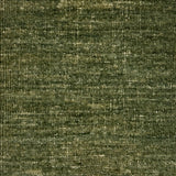 Textured handwoven carpet in green. 