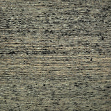 Textured flatweave carpet in black and aqua blue. 