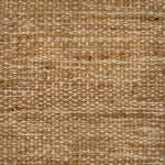 Close-up of a textured tan flatweave rug