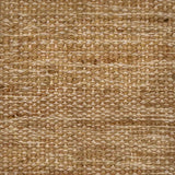 Close-up of a textured tan flatweave rug