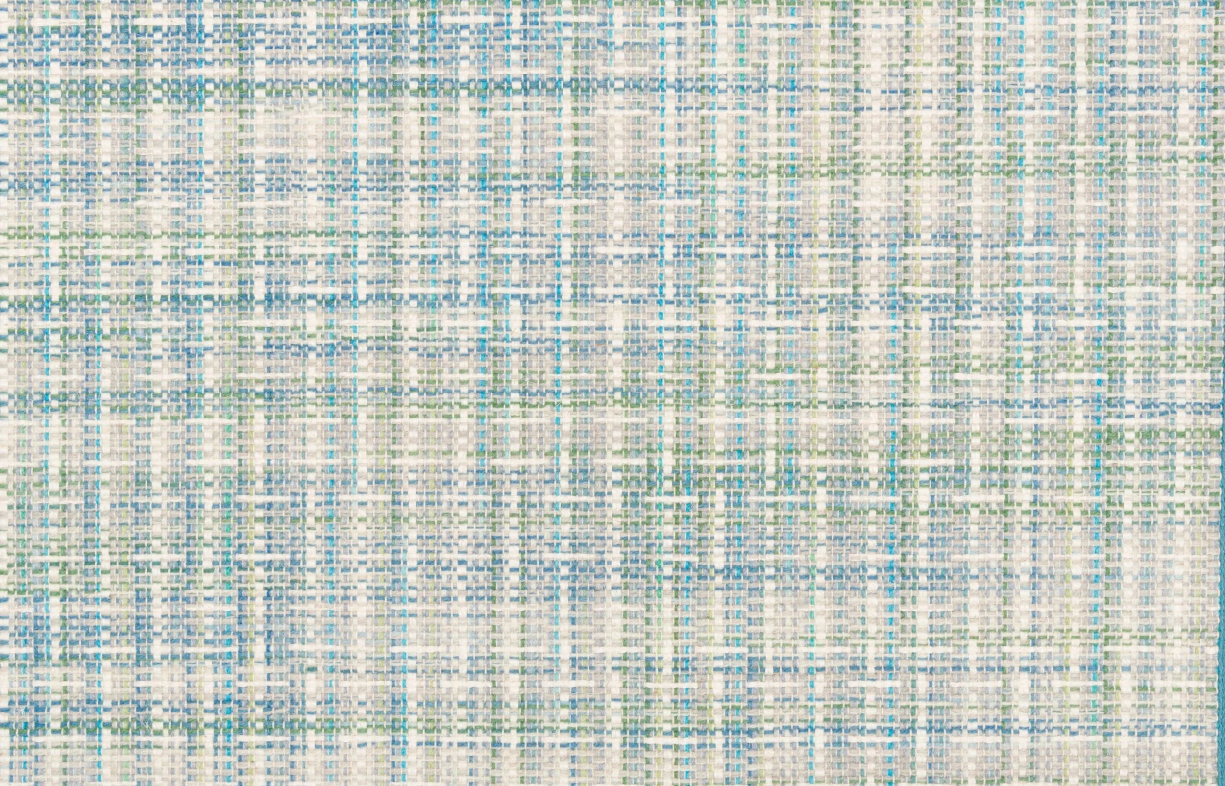 Textured broadloom carpet in shades of blue and cream.