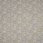 Printed fabric detail in a playful dot and line pattern in pale purple and lemon yellow