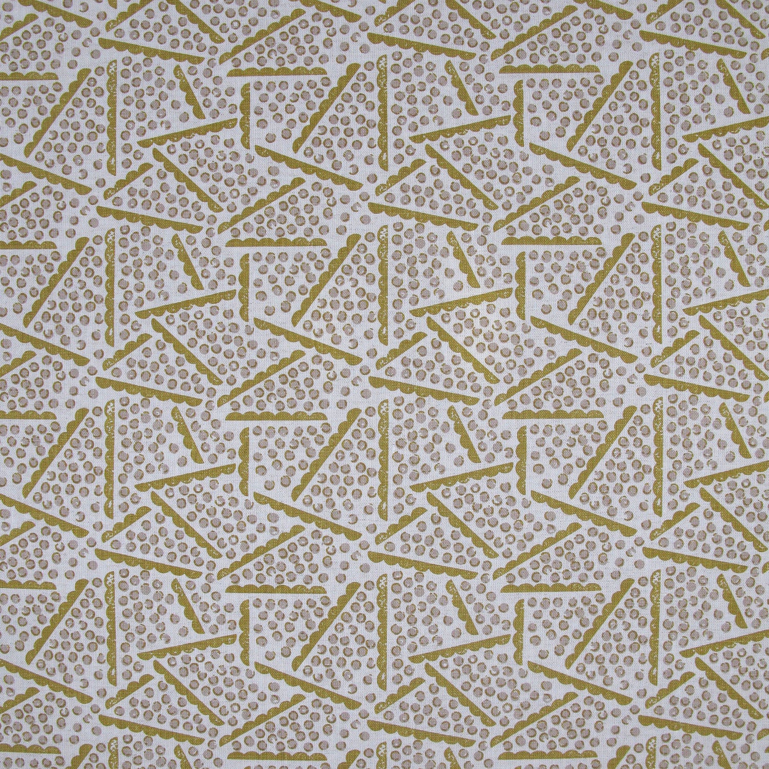 Printed fabric detail in a playful dot and line pattern in pale purple and lemon yellow