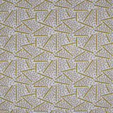 Printed fabric detail in a playful dot and line pattern in pale purple and lemon yellow