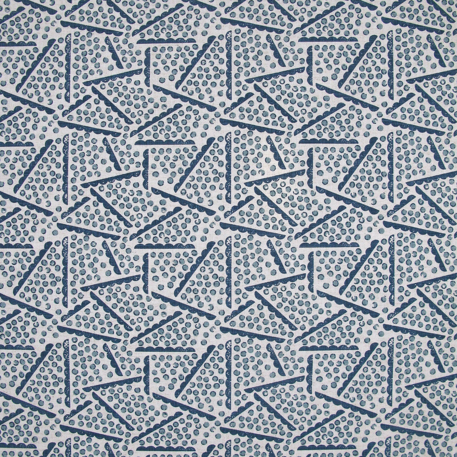 Printed fabric detail in a playful dot and line pattern in sky blue and indigo