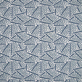 Printed fabric detail in a playful dot and line pattern in sky blue and indigo