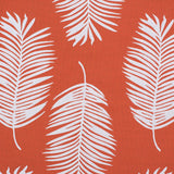 Palm print performance fabric in white on orange. 