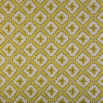 Detail of fabric in a playful floral grid print in yellow and brown on a white field.