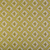 Detail of fabric in a playful floral grid print in yellow and brown on a white field.