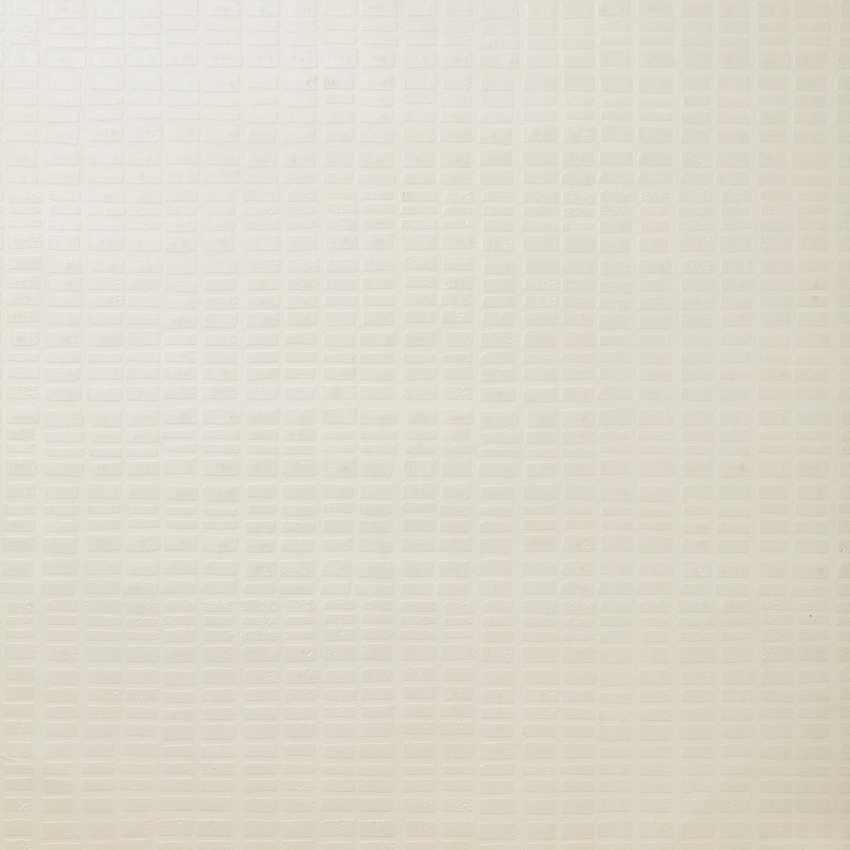 Detail of wallpaper in a grid print in cream.