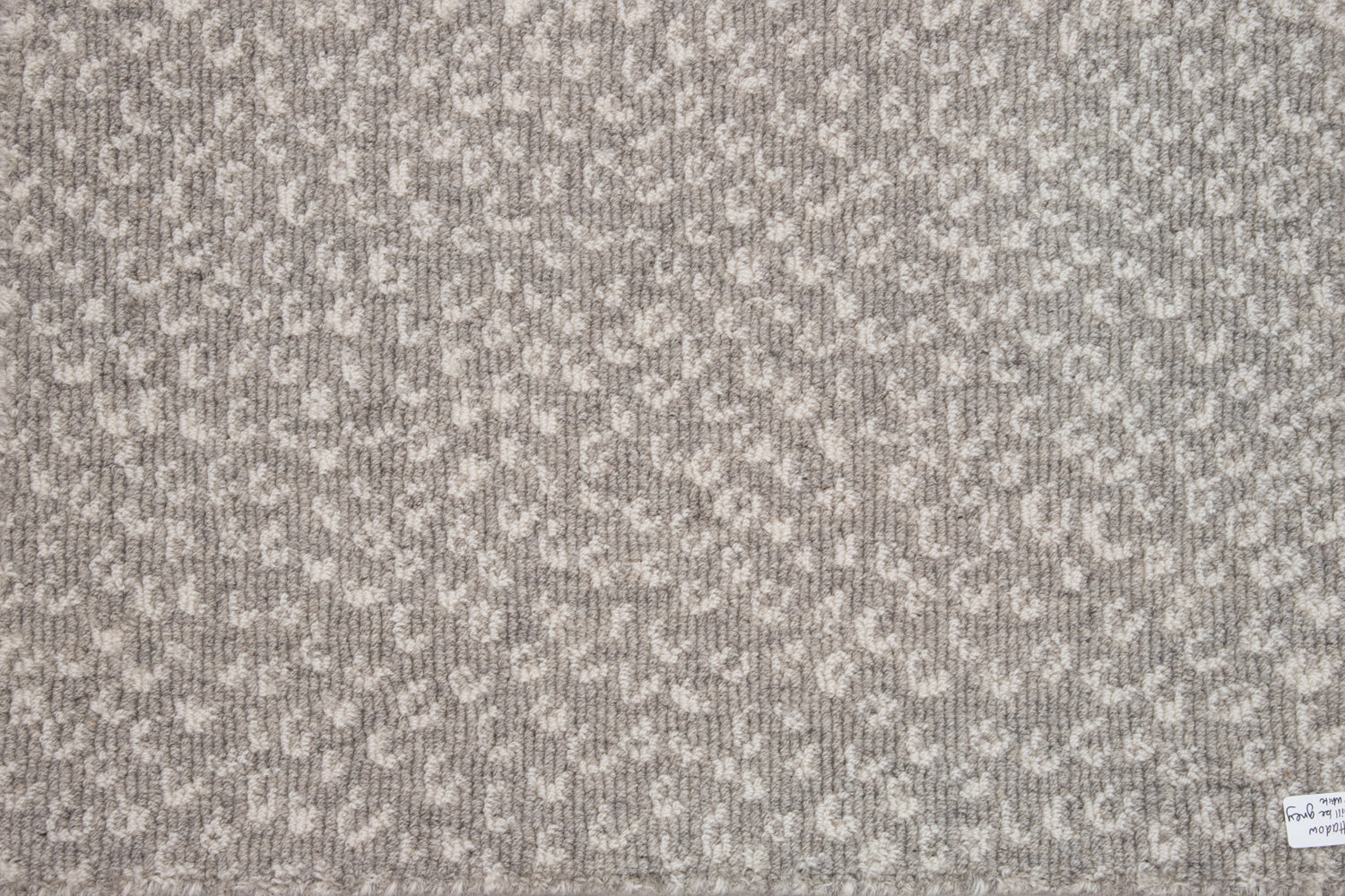 Broadloom carpet swatch textured design in light grey