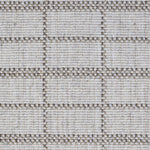 Broadloom carpet detail in plaid grid in shades of brown on a beige field.