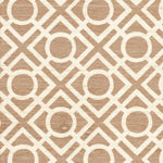 Detail of fabric in a geometric lattice print in light brown on a cream field.