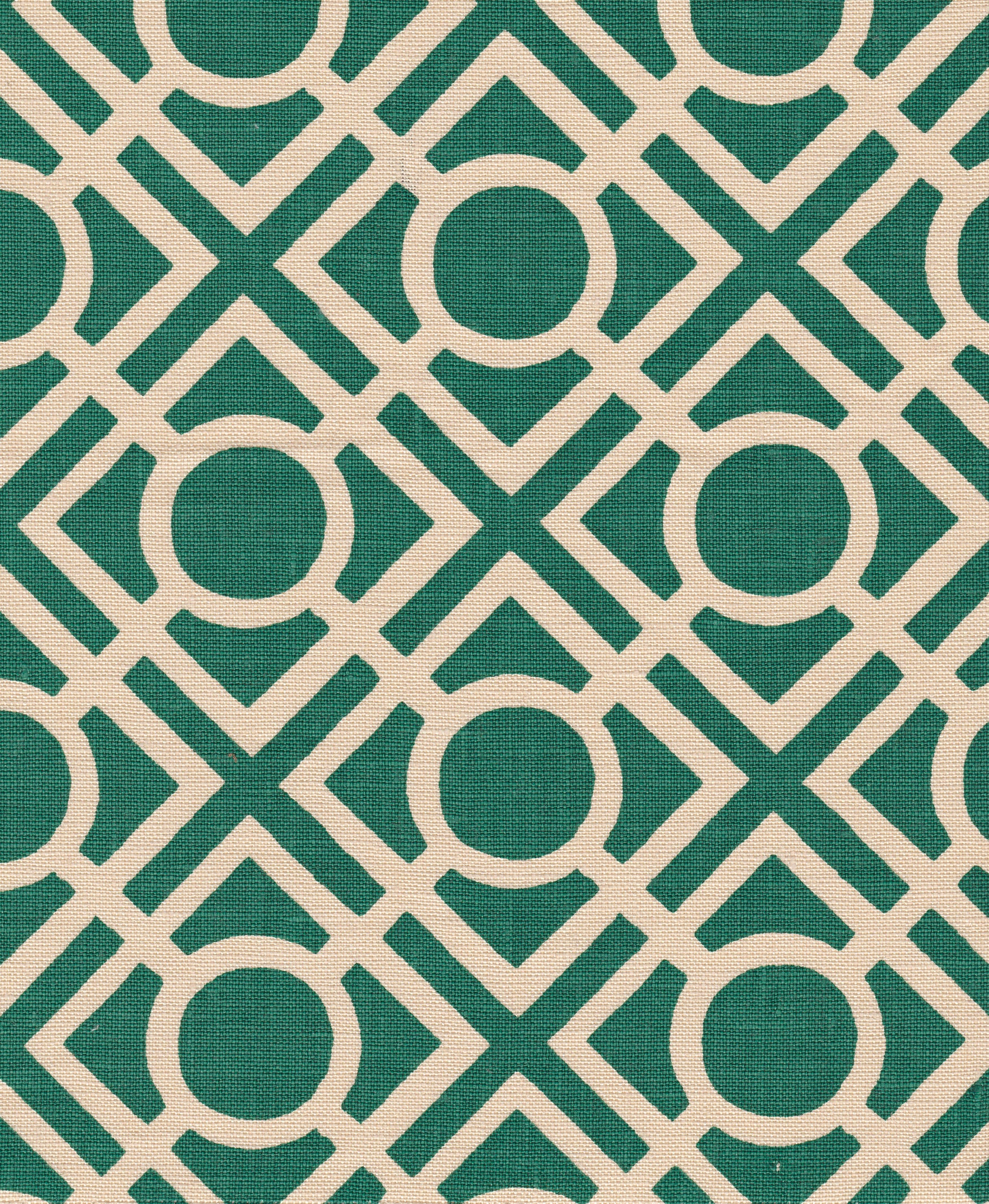 Detail of fabric in a geometric lattice print in turquoise on a cream field.