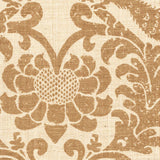 Detail of fabric in a botanical and bird print in brown on a cream field.