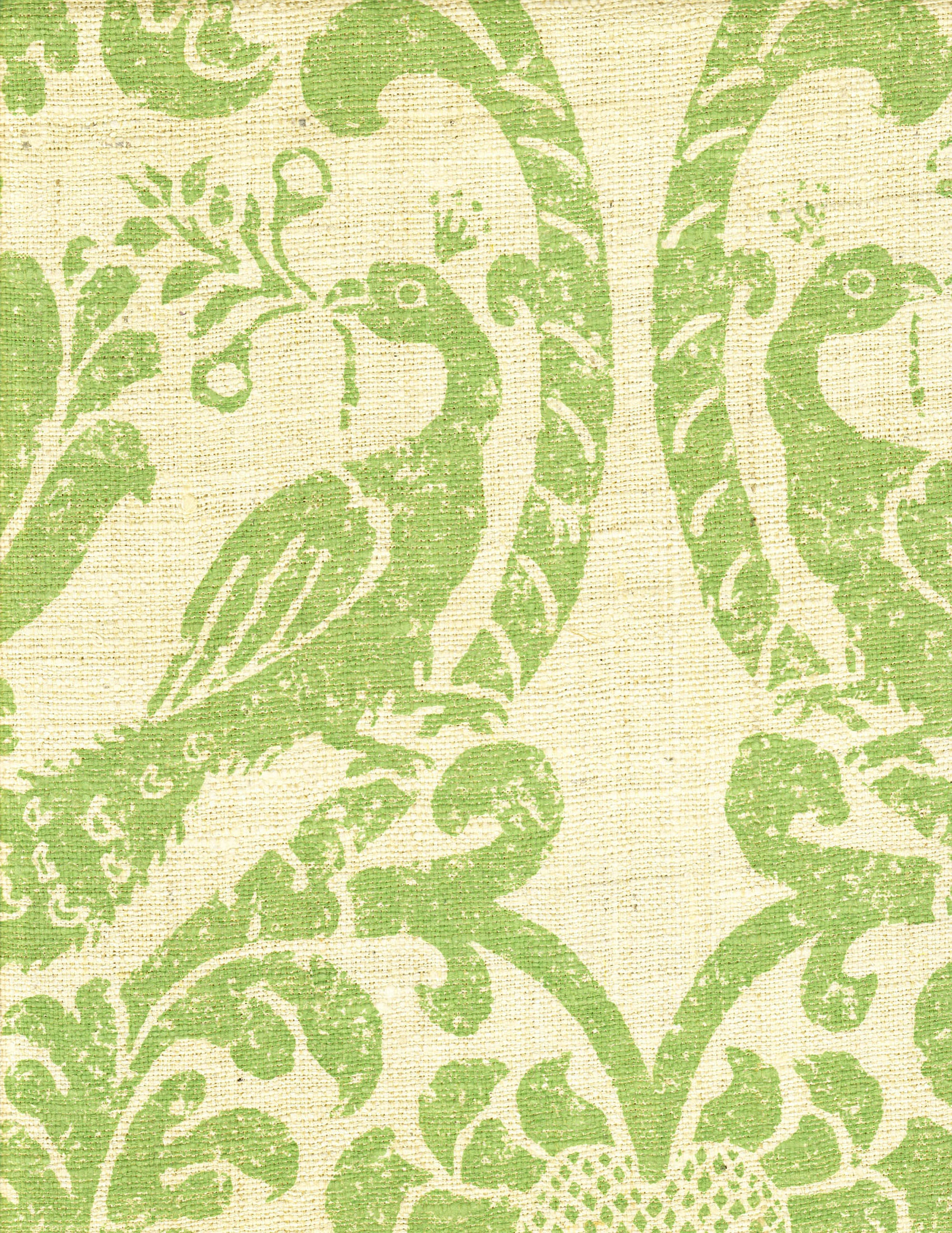 Detail of fabric in a botanical and bird print in green on a cream field.