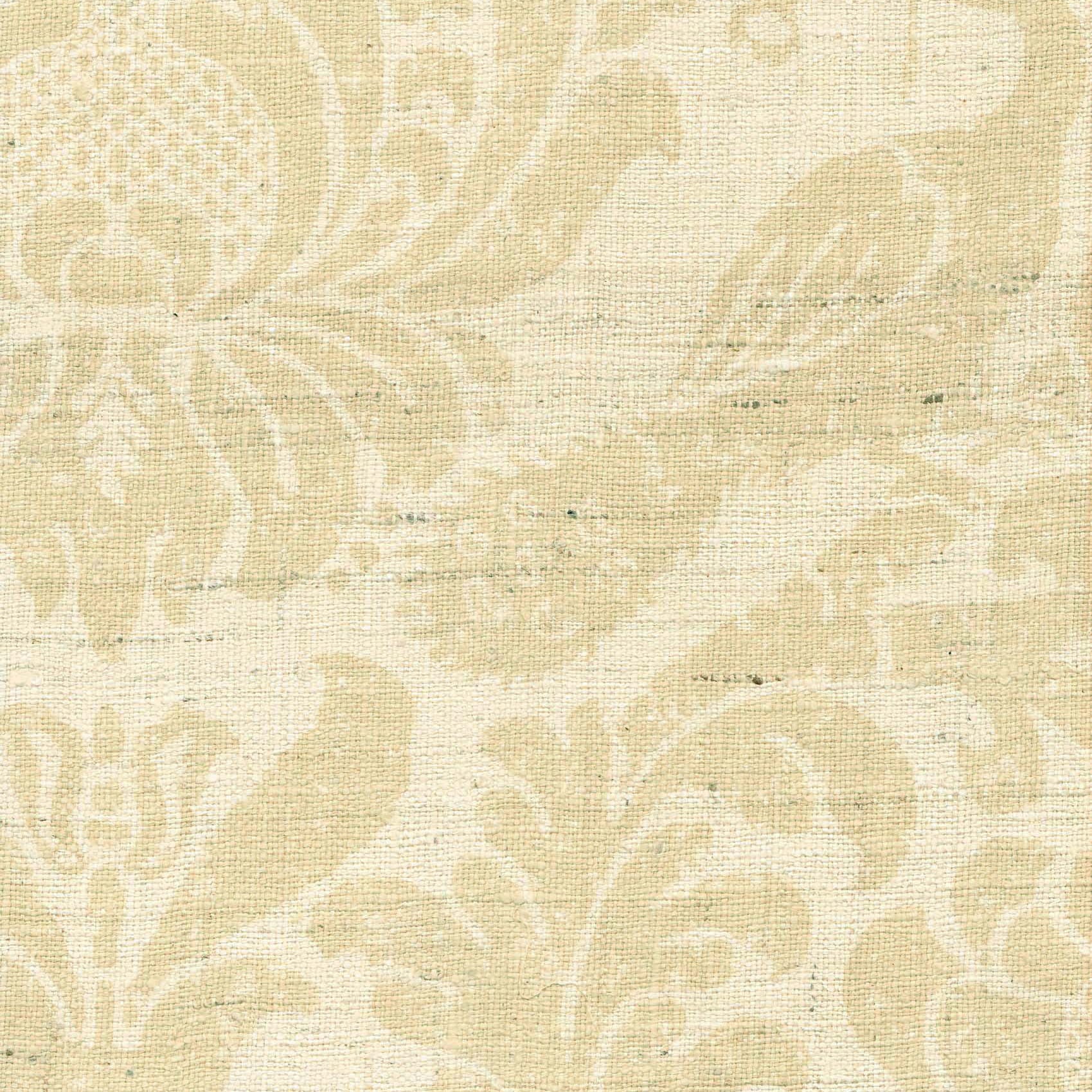 Detail of fabric in a botanical and bird print in tan on a cream field.