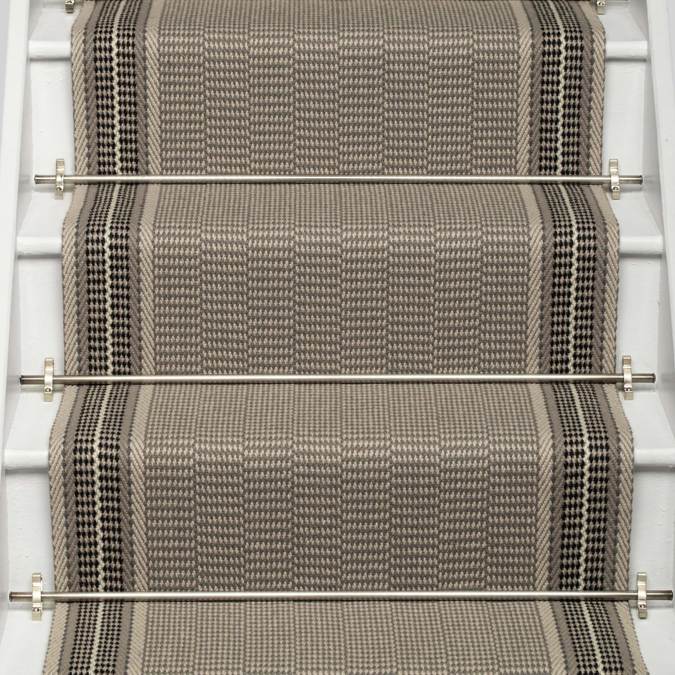 Striped flatweave runner in grey on white staircase