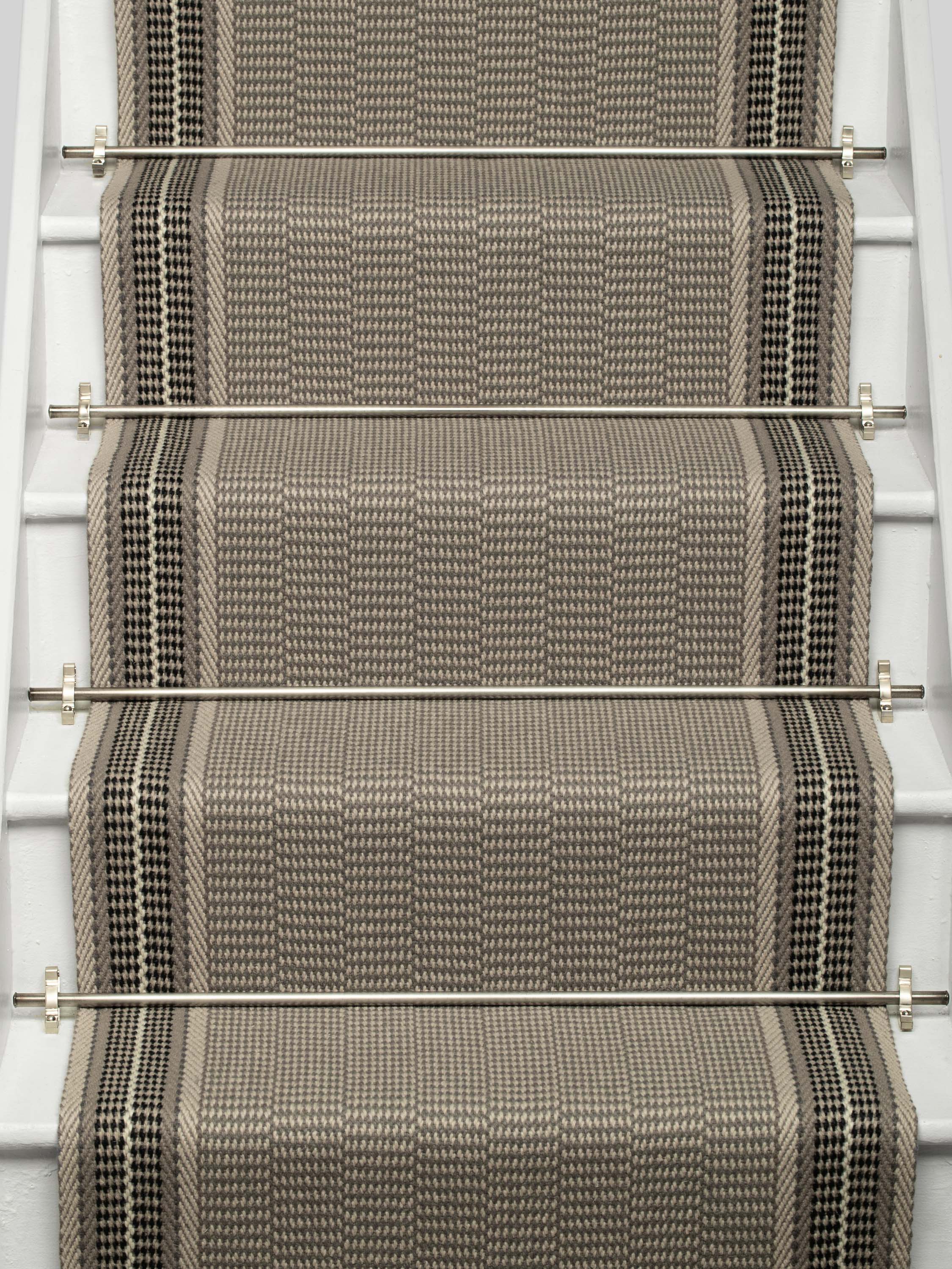 Striped flatweave runner in grey on white staircase