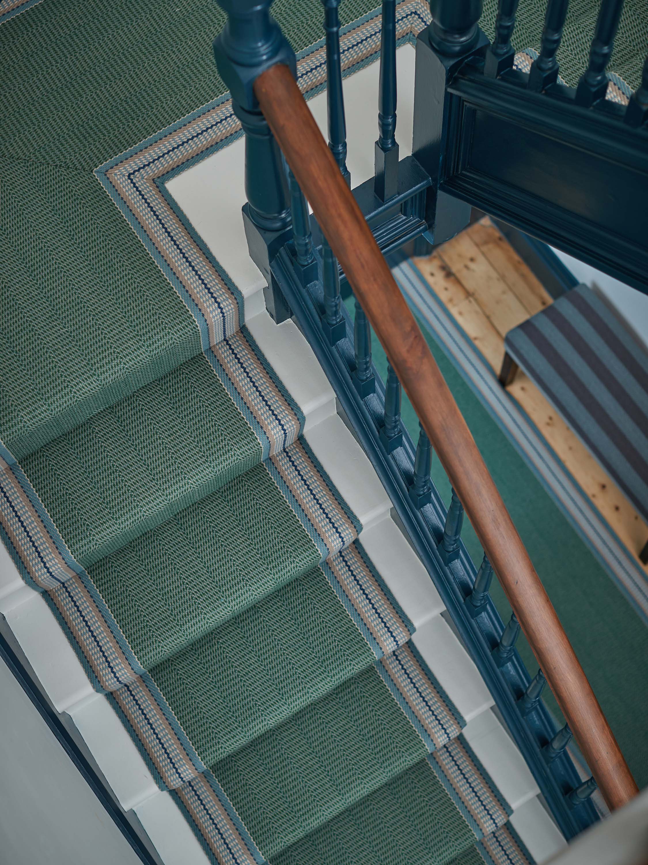 Striped flatweave runner in sage and grey on white staircase