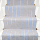 Striped flatweave runner in blue and grey on white staircase