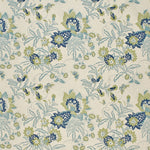 Printed fabric detail in a scrolling botanical print in bright blue, marine blue and light green. 