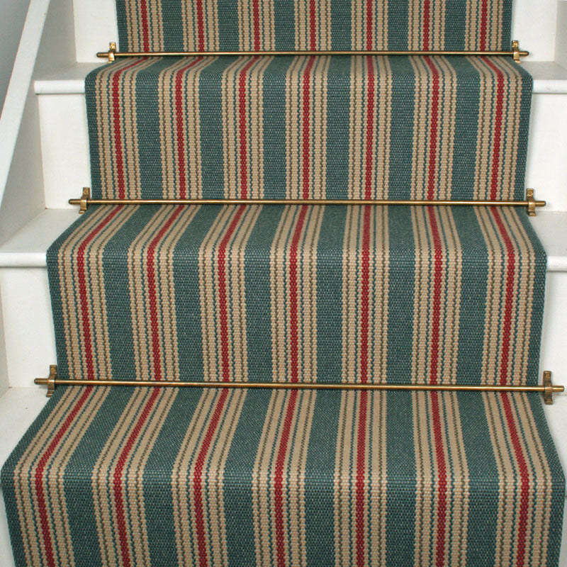 Striped flatweave runner in green yellow and tan on white staircase