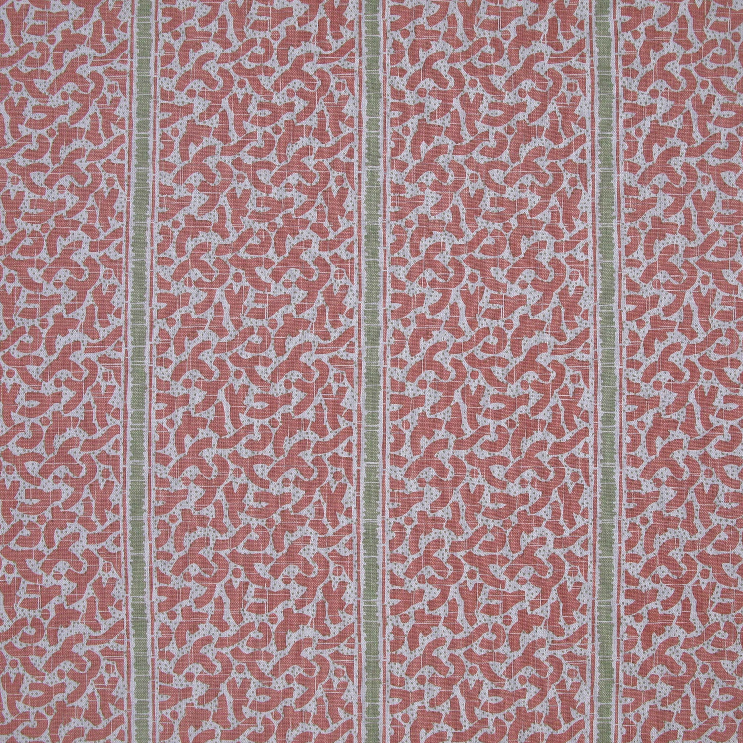 Printed fabric detail in a geometric rhythmic stripe in a warm pink with a light green accent. 