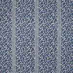 Printed fabric detail in a geometric rhythmic stripe in cobalt blue with a light blue accent. 