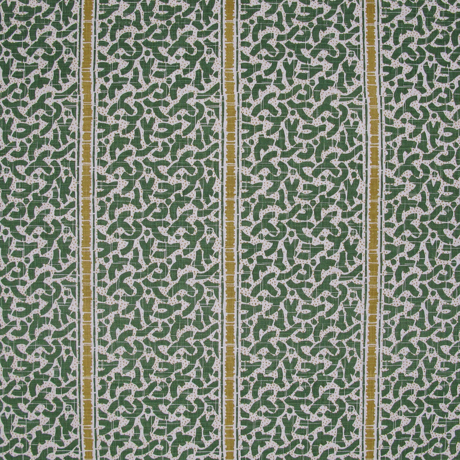 Printed fabric detail in a geometric rhythmic stripe in kelly green with a ochre yellow accent.