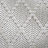 Broadloom carpet in a dimension diamond lattice in cream and taupe. 