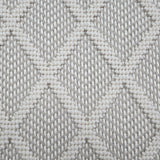 Broadloom carpet in a dimension diamond lattice in cream and warm grey.