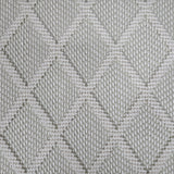 Broadloom carpet in a dimension diamond lattice in cream and grey-green