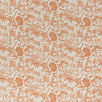 printed linen fabric in a carp and leaf pattern in orange on a beige field.