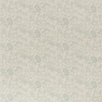 printed linen fabric in a carp and leaf pattern in misty blue on a beige field.