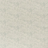 printed linen fabric in a carp and leaf pattern in misty blue on a beige field.