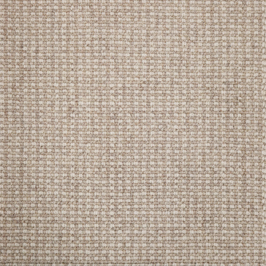 Broadloom carpet swatch in a textured pattern in a tan design