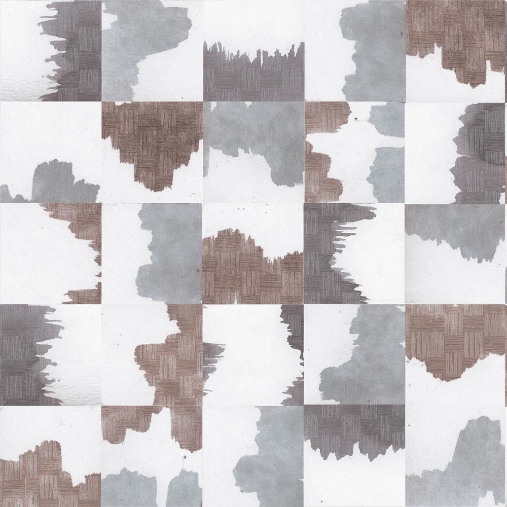 Detail of wallpaper in an abstract block print in shades of gray and brown on a cream field.