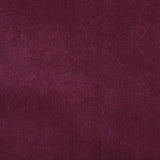 Detail of velvet fabric yardage in maroon.