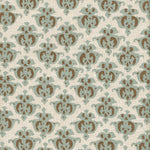 Detail of fabric in a repeating damask print in blue and brown on a cream field.