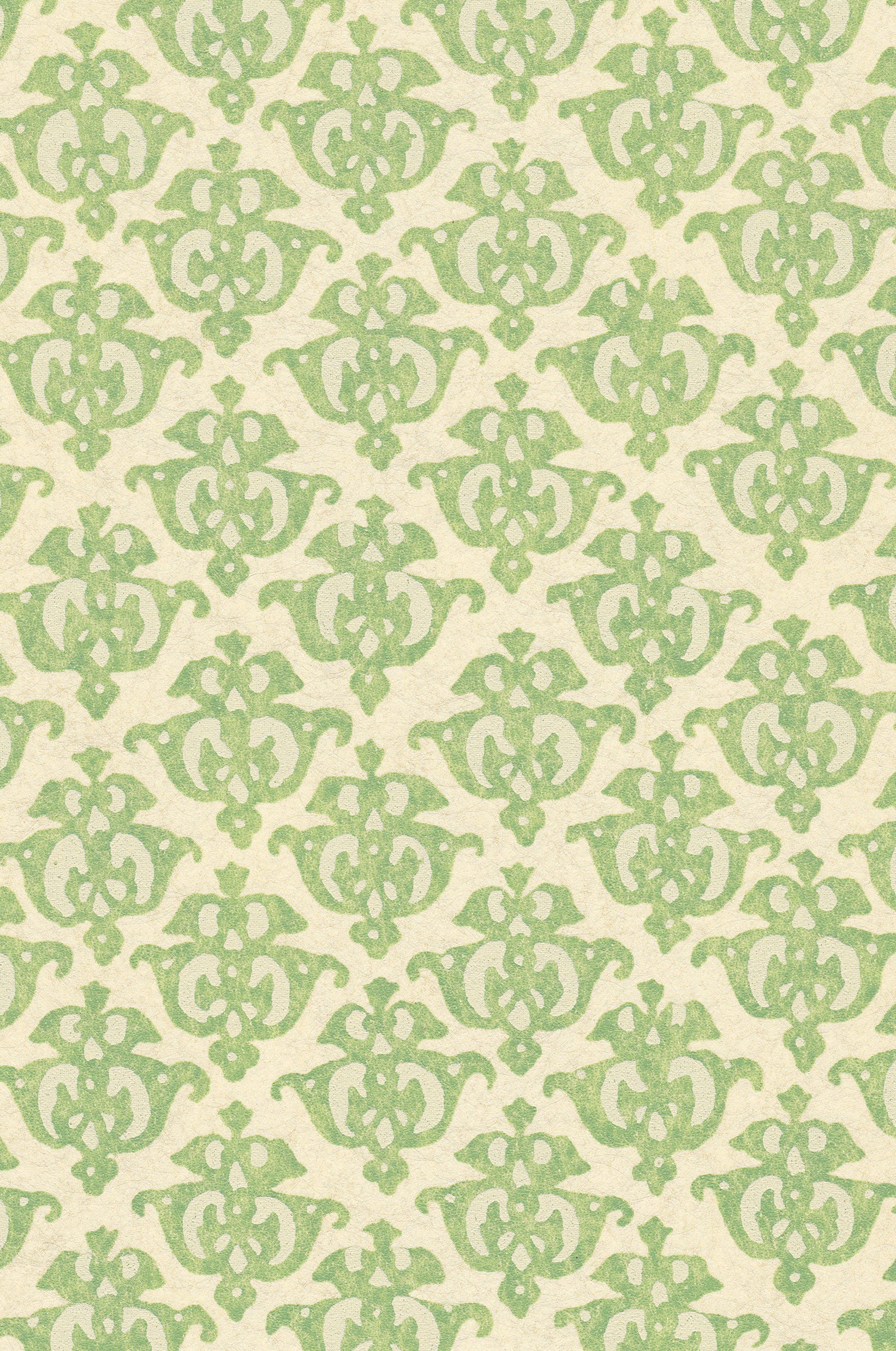 Detail of wallpaper in a repeating damask print in green on a cream field.