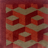 Geometric patterned rug with red and brown colors