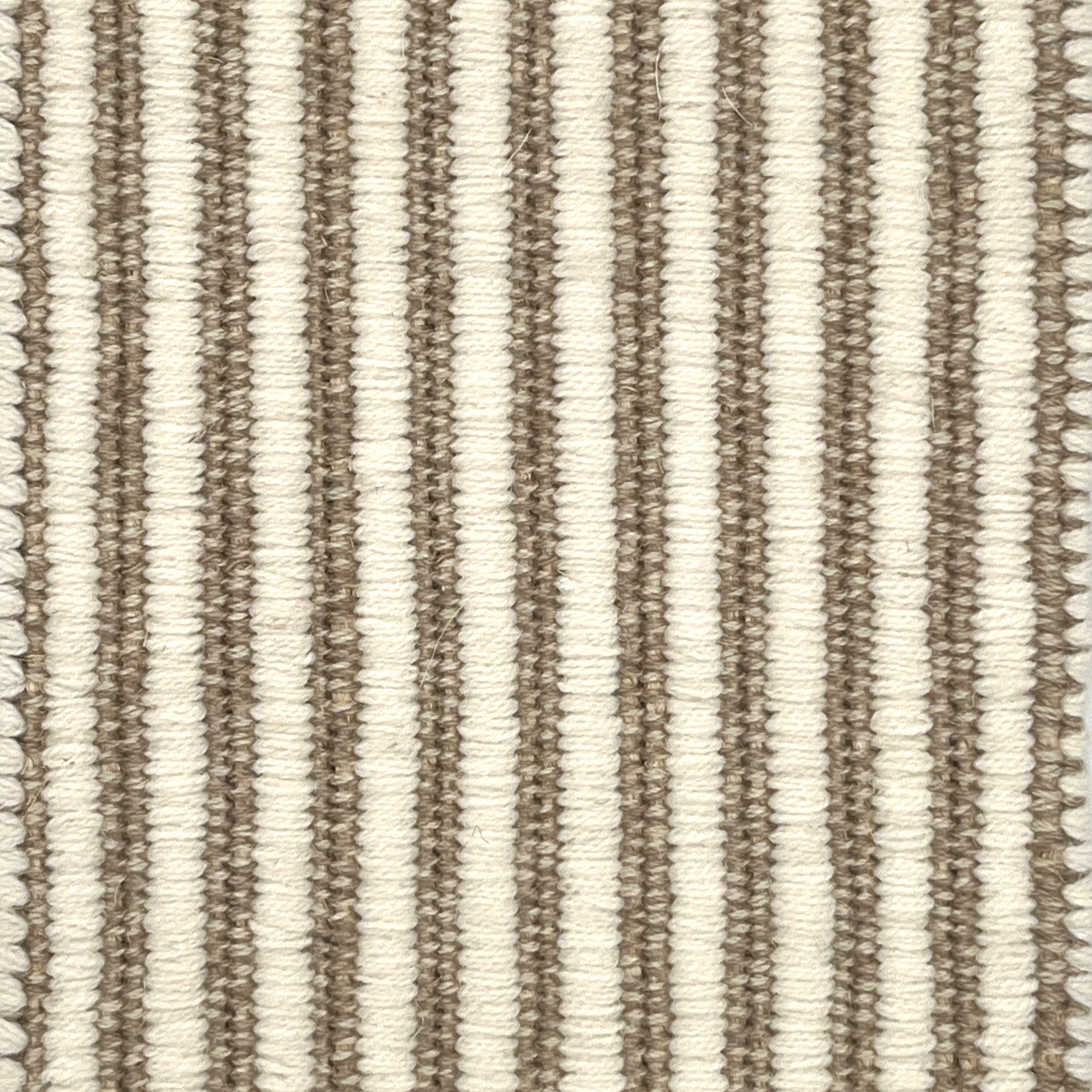 Textured area rug with vertical striped pattern on a neutral background
