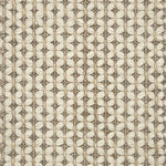 Textured flatweave carpet with a grid-like design in neutral colors.