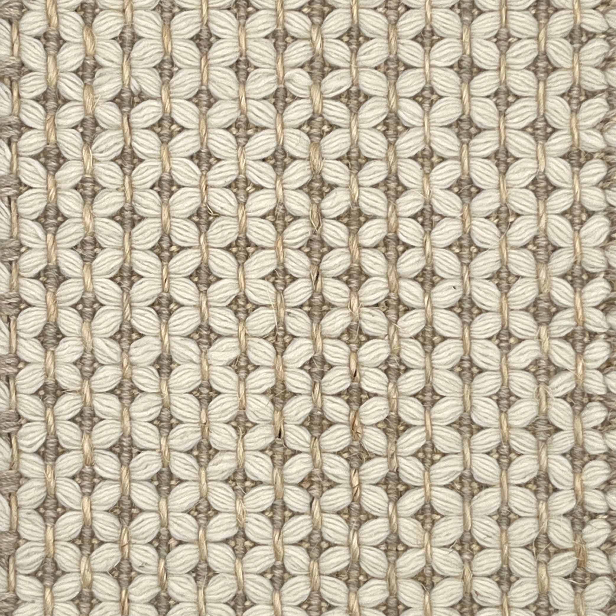 Textured flatweave carpet with a grid-like design in neutral colors.