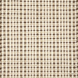 Close-up of a textured handmade rug with a grid pattern in beige and brown.