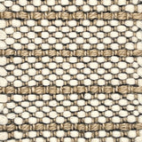 Close-up of a woven striped rug with beige and white colors.