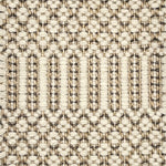 Close-up of a textured flatweave rug with a geometric pattern