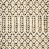 Close-up of a textured flatweave rug with a geometric pattern